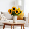 Bright yellow sunflowers arranged in a vase – cheerful British-grown blooms
