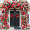 Red Christmas flower decorations around front door entrance
