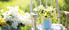 Summer flowers in a vase in a garden - LOV Flowers