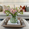 Seasonal British flowers delivery in a vase on a table