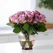 Purple roses arranged for a luxury gift bouquet